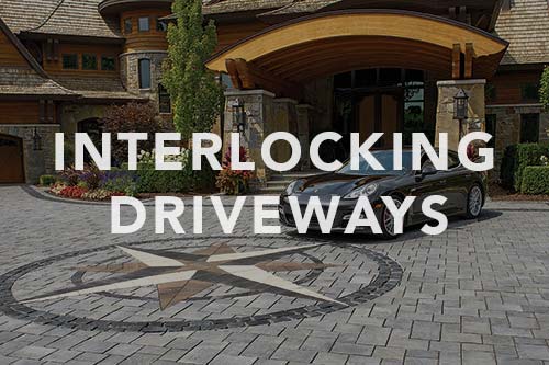 Interlocking driveway with intricate pattern, link to interlocking driveways photo gallery.